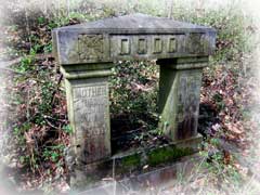 Family grave marker for J T and Mittie Dodd